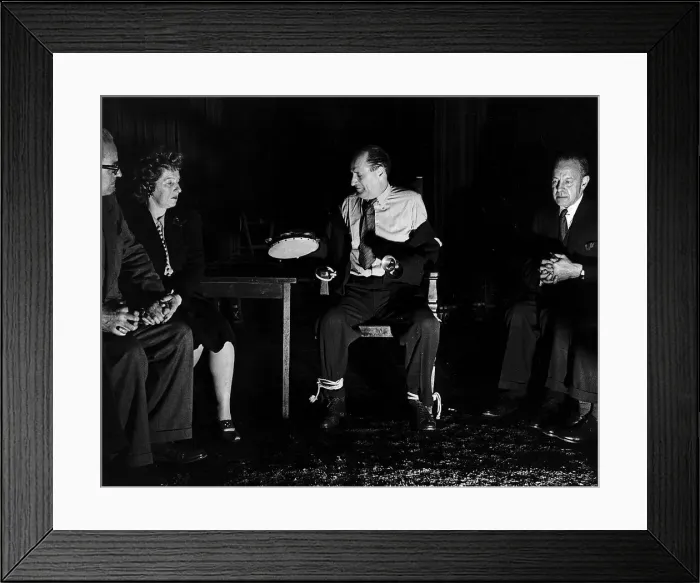Framed Print : An escapist has his hands free from the ropes and takes off his coat as a ringing of Framed Print : An escapist has his hands free from the ropes and takes off his coat as a ringing of