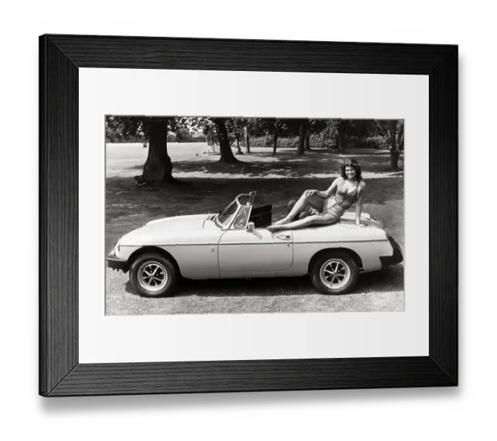 Framed Print : MGB Convertable Sport 1975 - Motors - Motor Cars Car sexy model posing on top Framed Print : MGB Convertable Sport 1975 - Motors - Motor Cars Car sexy model posing on top