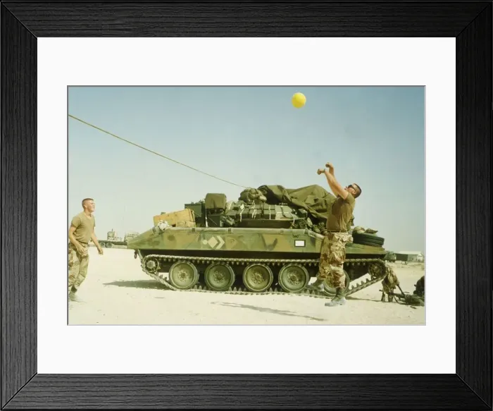 Framed Print : US troops play volley ball to pass the time during the build up of force before the start