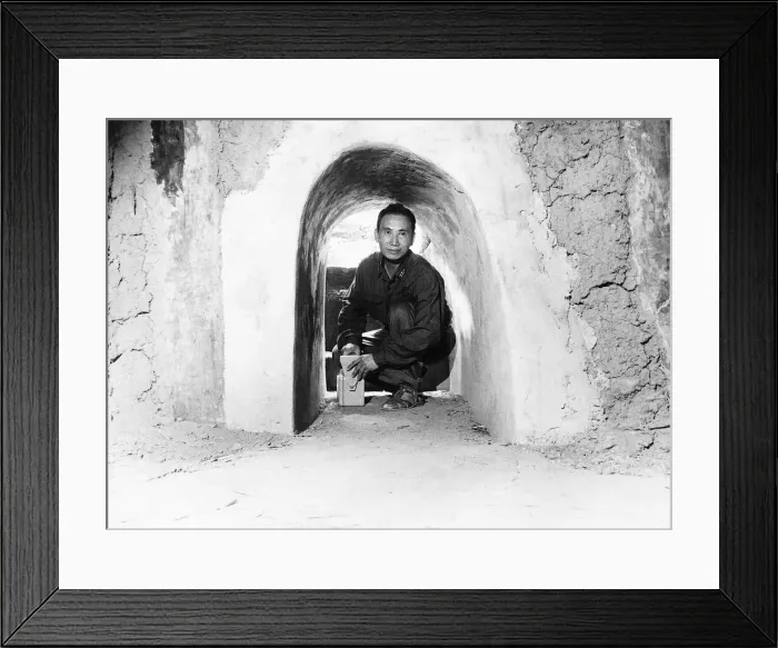 Framed Print : At Cu Chi 50 miles from Saigon ex Vietcong Minh soldier shows part of the 200 mile Framed Print : At Cu Chi 50 miles from Saigon ex Vietcong Minh soldier shows part of the 200 mile