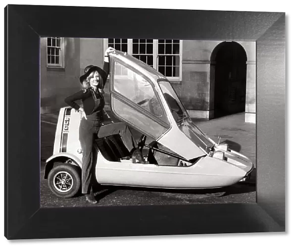 Bond Three Wheeler Bug 1970 - Motors Motor Cars Car model Vickie Hodge poses