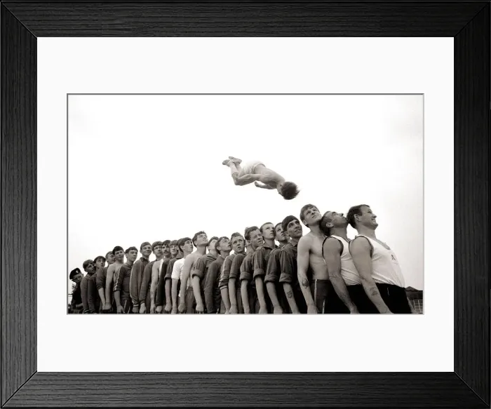 Framed Print : Jumping John Reid sails over twenty-four men with his sergeant major in the number one Framed Print : Jumping John Reid sails over twenty-four men with his sergeant major in the number one