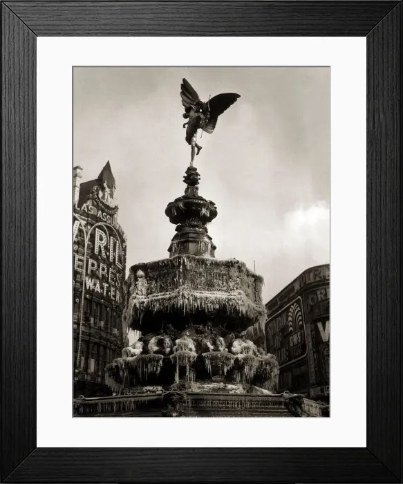 Framed Print : The statue of Eros in London - February 1956 the fountain has frozen over forming