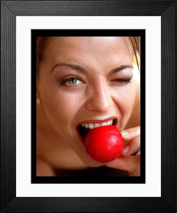 Framed Print : Model eating plum March 1998 Framed Print : Model eating plum March 1998