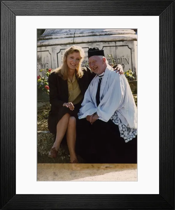 Framed Print : Kate Buffery sitting on wall with Priest January 1989 Dbase Framed Print : Kate Buffery sitting on wall with Priest January 1989 Dbase