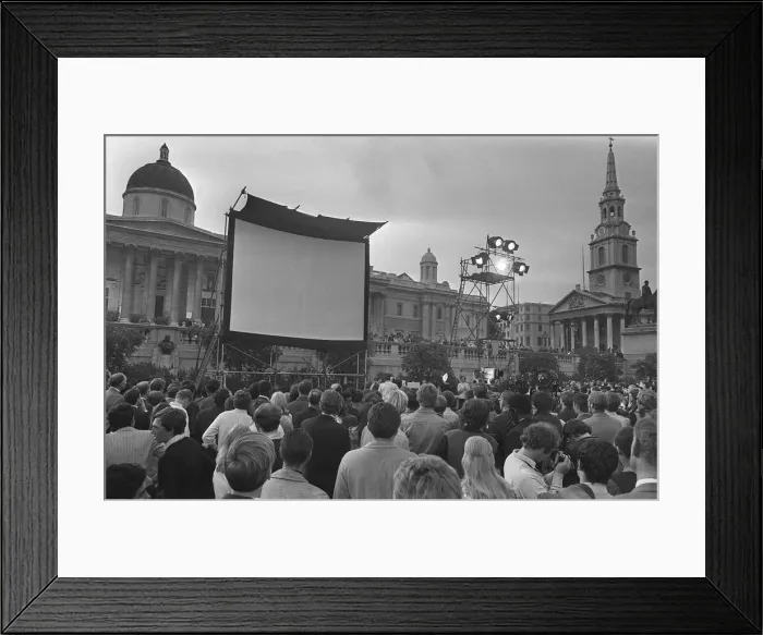 Framed Print : Trafalgar Square London July 1969 A giant TV screen in Trafalgar Square has been