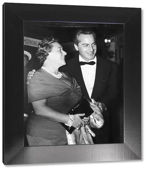 Rossano Brazzi Italian Actor wearing Bow tie and Dinner Jacket. Pictured With his wife