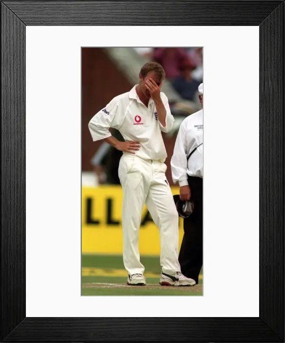 Framed Print : England v New Zealand Cricket Third Test August 1999 Phil Tufnell holds his head after Framed Print : England v New Zealand Cricket Third Test August 1999 Phil Tufnell holds his head after