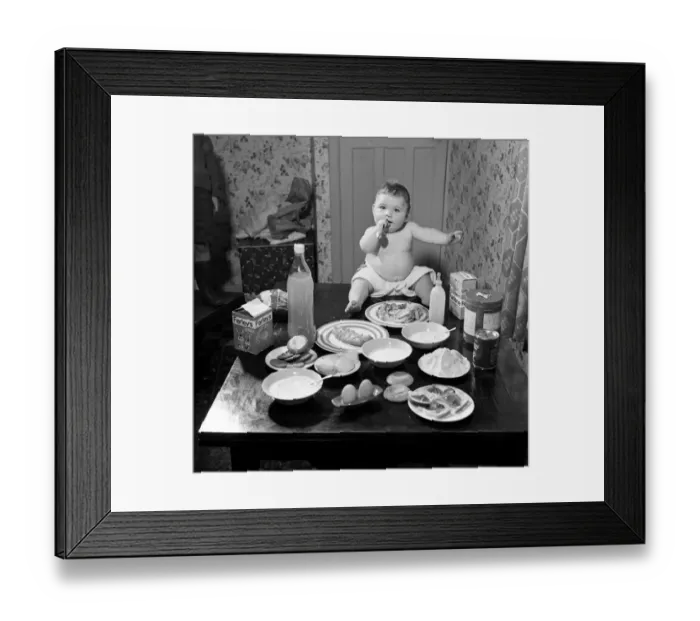 Framed Print : Victor Reay 2 1 / 2 stone 7 month old baby sitting on table with the food that Framed Print : Victor Reay 2 1 / 2 stone 7 month old baby sitting on table with the food that