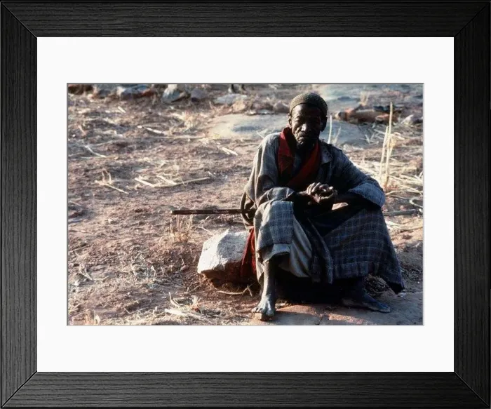  : Mali Dagon Tribe Houlou Barou Holy Man at dawn waits reading of sacred tabloid