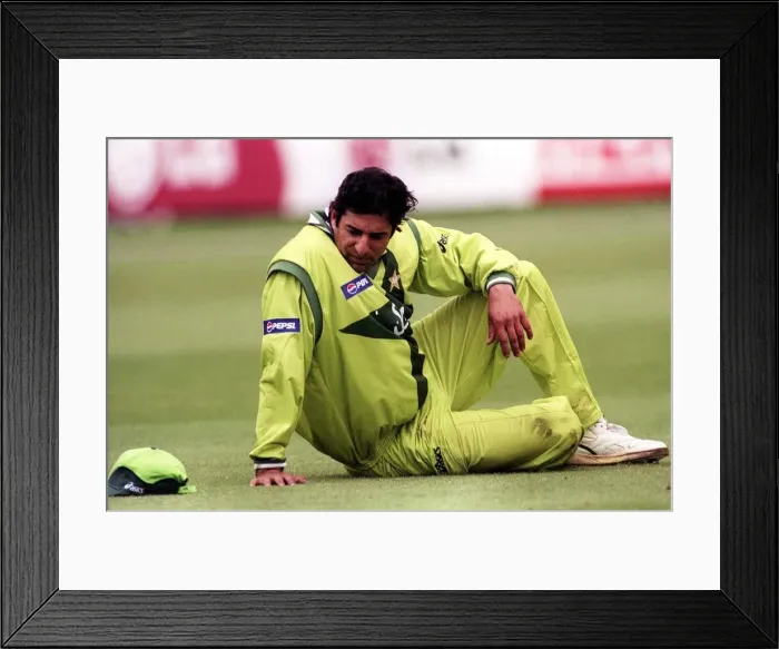 Framed Print : A dejected looking Wasim Akrim June 1999 as his Pakistan side lose to India Framed Print : A dejected looking Wasim Akrim June 1999 as his Pakistan side lose to India
