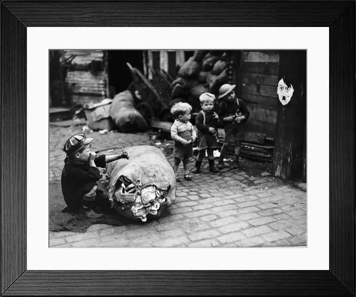 Framed Print : London children using Hitler as a target in a game of soldiers Framed Print : London children using Hitler as a target in a game of soldiers