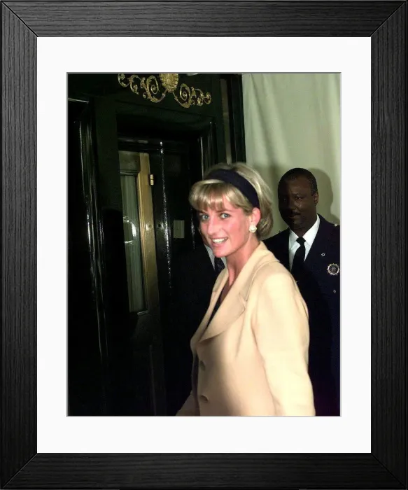 Framed Print : Diana, Princess of Wales, wearing sand coloured suit with black top and matching headband Framed Print : Diana, Princess of Wales, wearing sand coloured suit with black top and matching headband