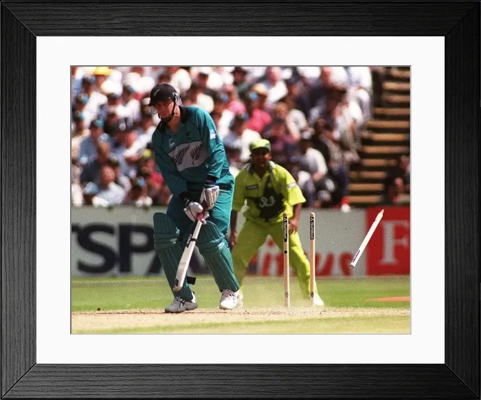 Framed Print : Matthew Horne is bowled by Abdul Razzaq June 1999 during the Semi Final of Framed Print : Matthew Horne is bowled by Abdul Razzaq June 1999 during the Semi Final of