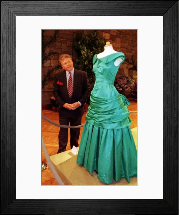 Framed Print : James whitaker examines Princess Dianas Dress June 1997 the dress is on display at a Framed Print : James whitaker examines Princess Dianas Dress June 1997 the dress is on display at a