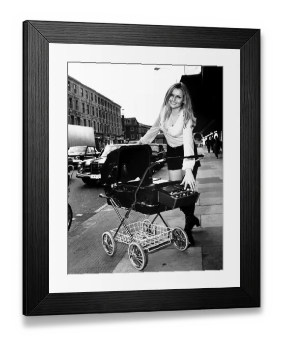 Framed Print : Jenny Caroline Goodman demonstrating the Raleigh Dreamline Special Pram outside the Ideal