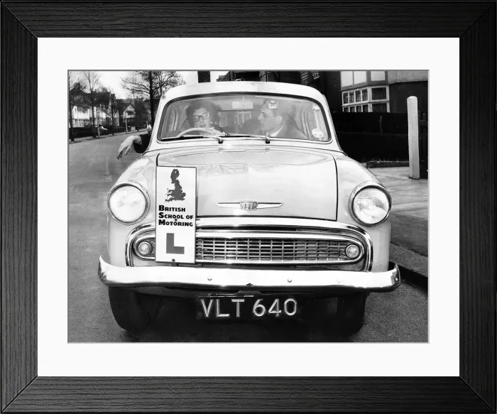 Framed Print : Marjorie Proops learns to drive DBase Framed Print : Marjorie Proops learns to drive DBase