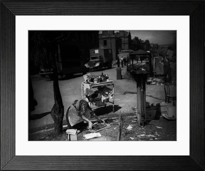 Framed Print : Lewisham Hospital after air Raid during WW2 1944 with nurse collecting some Framed Print : Lewisham Hospital after air Raid during WW2 1944 with nurse collecting some