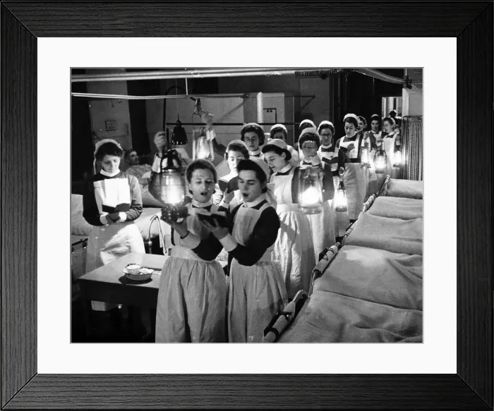 Framed Print : Nurses sing carols on Christmas Eve to patients in hospital in the wards 1940 World War Framed Print : Nurses sing carols on Christmas Eve to patients in hospital in the wards 1940 World War