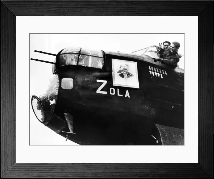 Framed Print : Crew of an RAF Avro Lancaster bomber point to nose art on their plane WW2 1942 Framed Print : Crew of an RAF Avro Lancaster bomber point to nose art on their plane WW2 1942