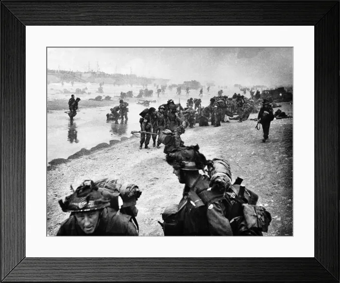 Framed Print : Allied troops land on beach during World War Two invasion
