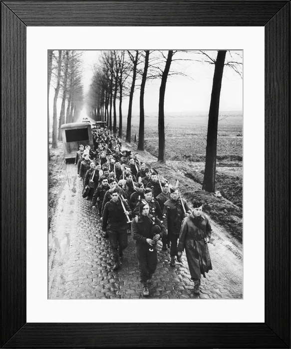 Framed Print : Royal Irish Fusiliers are piped back to their camp after a days work in France
