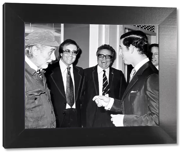 Peter Sellers and his two partners from the Goons meet Prince Charles at a function