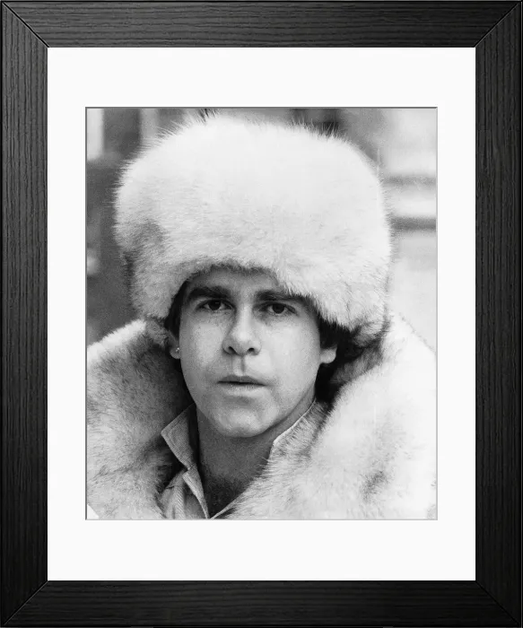Framed Print : Elton John Pop Singer Wearing A White Fur Hat And Coat Framed Print : Elton John Pop Singer Wearing A White Fur Hat And Coat
