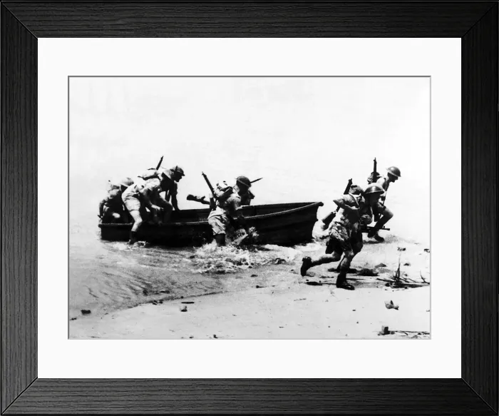 Framed Print : 11th Battalion Royal Marines run ashore from a dingy while training in Ceylon