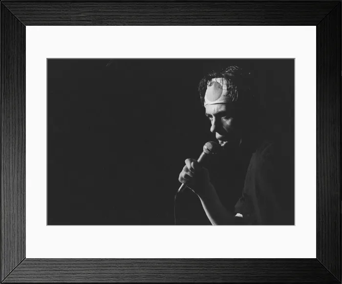 Framed Print : Bob Geldof of the Boomtown Rats pop group, pictured wearing a headband during a concert Framed Print : Bob Geldof of the Boomtown Rats pop group, pictured wearing a headband during a concert