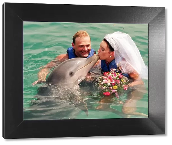 David Blades dolphin wedding Bahamas 1998 marries bride Avril Thomson in Blue