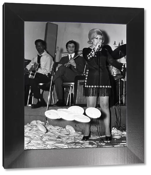 Maria Ikonomidou sings as plates break at her feet 1970 at Elysee Greek Restaurant