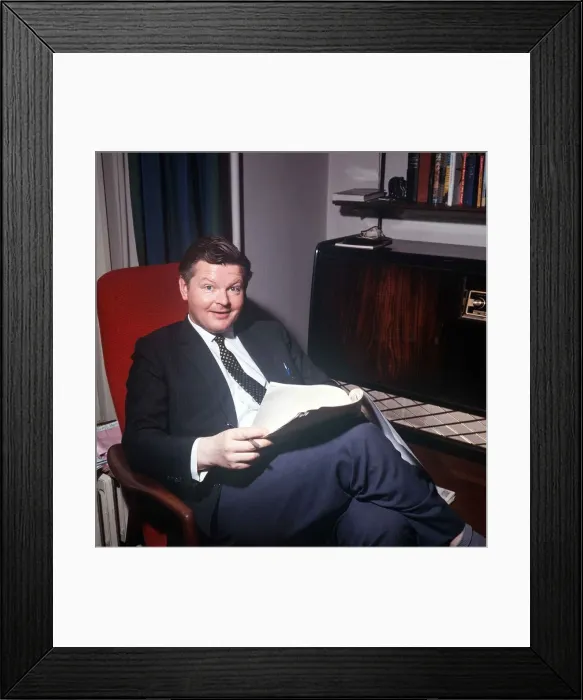 Framed Print : The comic actor Benny Hill in his Kensington flat reading February 1966 in his armchair Framed Print : The comic actor Benny Hill in his Kensington flat reading February 1966 in his armchair