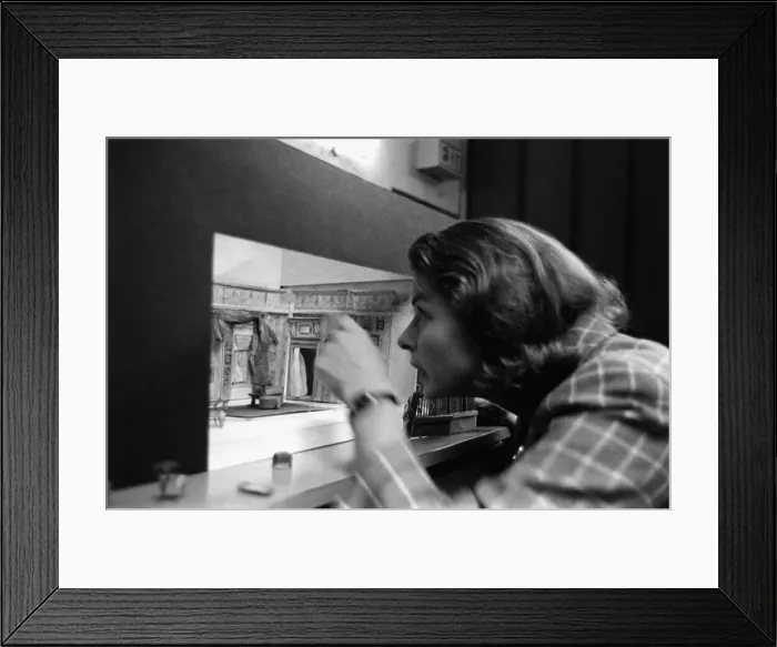 Framed Print : Ingrid Bergman is fascinated with the replicia of the stage set for the play she will be Framed Print : Ingrid Bergman is fascinated with the replicia of the stage set for the play she will be