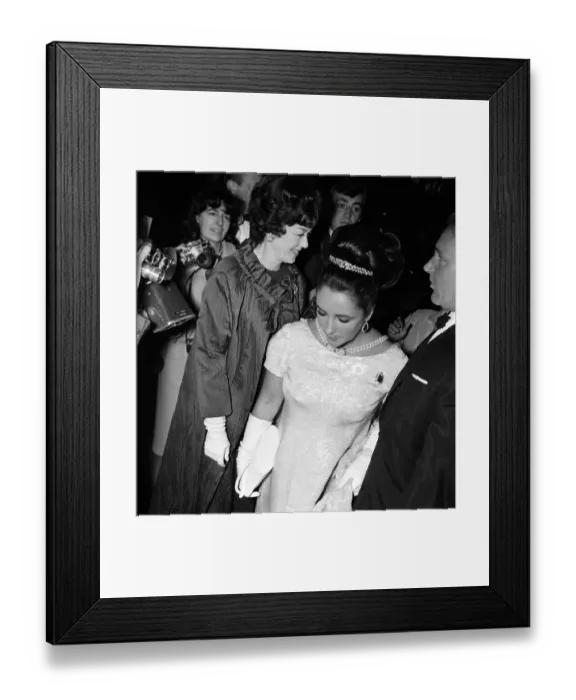 Framed Print : Elizabeth Taylor November 1965 and husband Richard Burton at Hollywood Party