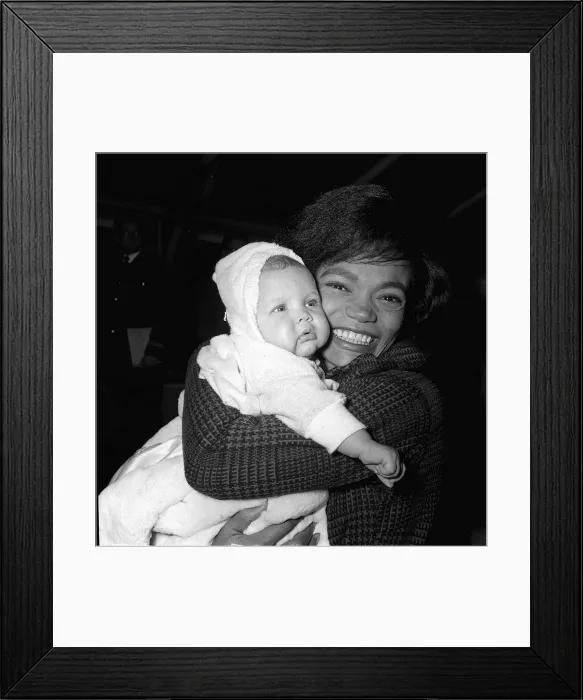 Framed Print : Eartha Kitt singer actress with her baby March 1962 Framed Print : Eartha Kitt singer actress with her baby March 1962