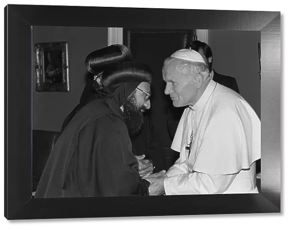 Pope John Paul II in during his visit to Britain in 1982 visits the home of