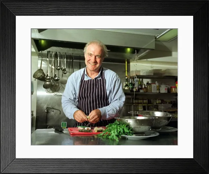 Framed Print : Rick Stein Chef TV Presenter June 1999 working in his kitchen Framed Print : Rick Stein Chef TV Presenter June 1999 working in his kitchen