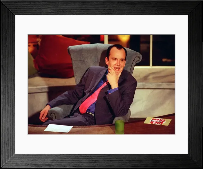 Framed Print : Jack Docherty sitting in chair next to desk in Channel 5 studio April 1997 Framed Print : Jack Docherty sitting in chair next to desk in Channel 5 studio April 1997