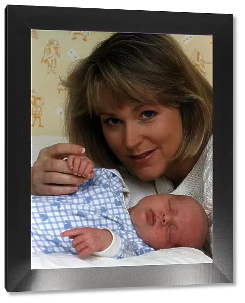 Kathryn Holloway TV Presenter of UK Livings Agony Programme with baby son James Holloway