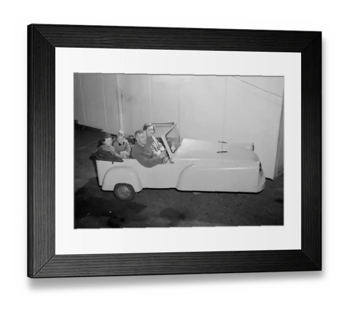 Framed Print : Bond Minicar. A three wheeled small open top car. The driver of this car is Lt, Col, M. G