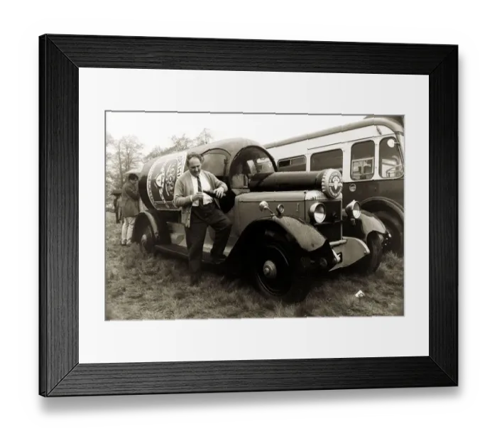 Framed Print : John Horton from Sussex standing beside a 1924 Daimler built in the shape of a bottle Framed Print : John Horton from Sussex standing beside a 1924 Daimler built in the shape of a bottle