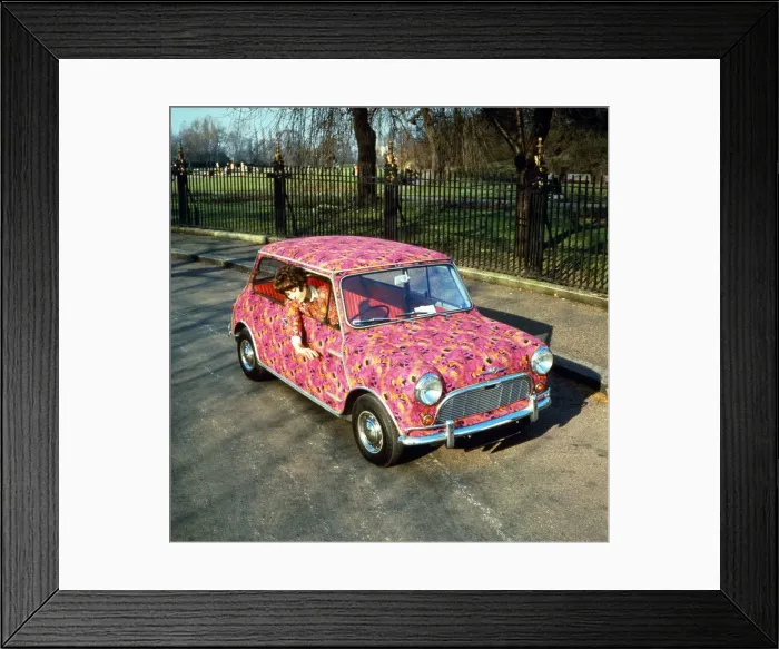 Framed Print : Sandra Ford driving her paisley coloured Mini February 1969