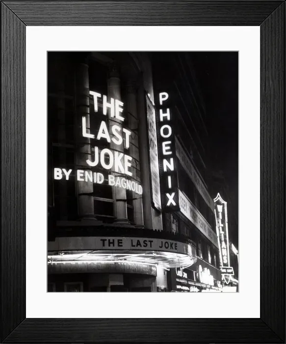 Framed Print : Neon lights advertise the play The Last Joke Framed Print : Neon lights advertise the play The Last Joke