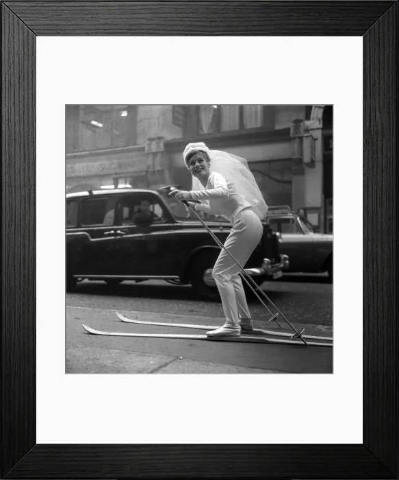 Framed Print : Fashion wedding dress on skis - A rather unusual method of getting to the Church on time Framed Print : Fashion wedding dress on skis - A rather unusual method of getting to the Church on time