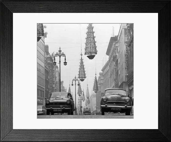 Framed Print : Christmas lights and decorations in Oxford Street, London 1962 Framed Print : Christmas lights and decorations in Oxford Street, London 1962