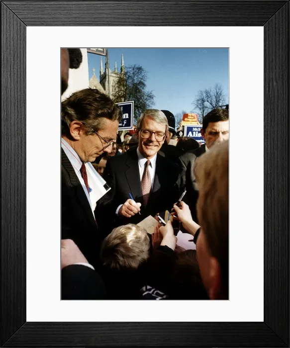 Framed Print : John Major Prime Minister signs a boys wage packet at Selby during the 1992 elections Framed Print : John Major Prime Minister signs a boys wage packet at Selby during the 1992 elections