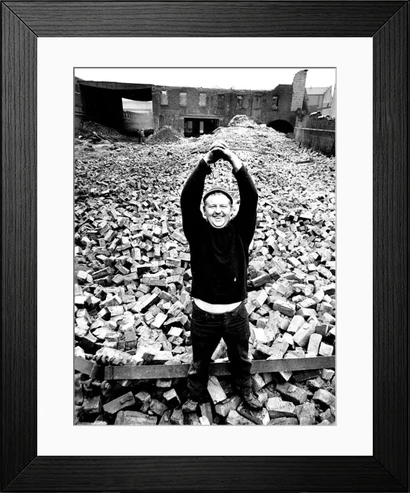 Framed Print : Demolition Man at work. April 1970