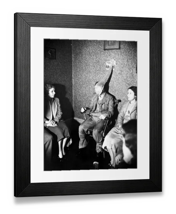 Framed Print : Taken at an ordinary seance by Leon Isaacs. Note the similarity in appearance of Framed Print : Taken at an ordinary seance by Leon Isaacs. Note the similarity in appearance of