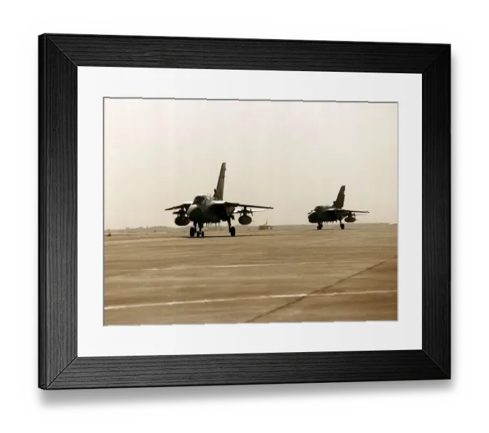 Framed Print : Two RAF Panavia Tornado F3 fighter planes used in the Gulf War taxi along runway